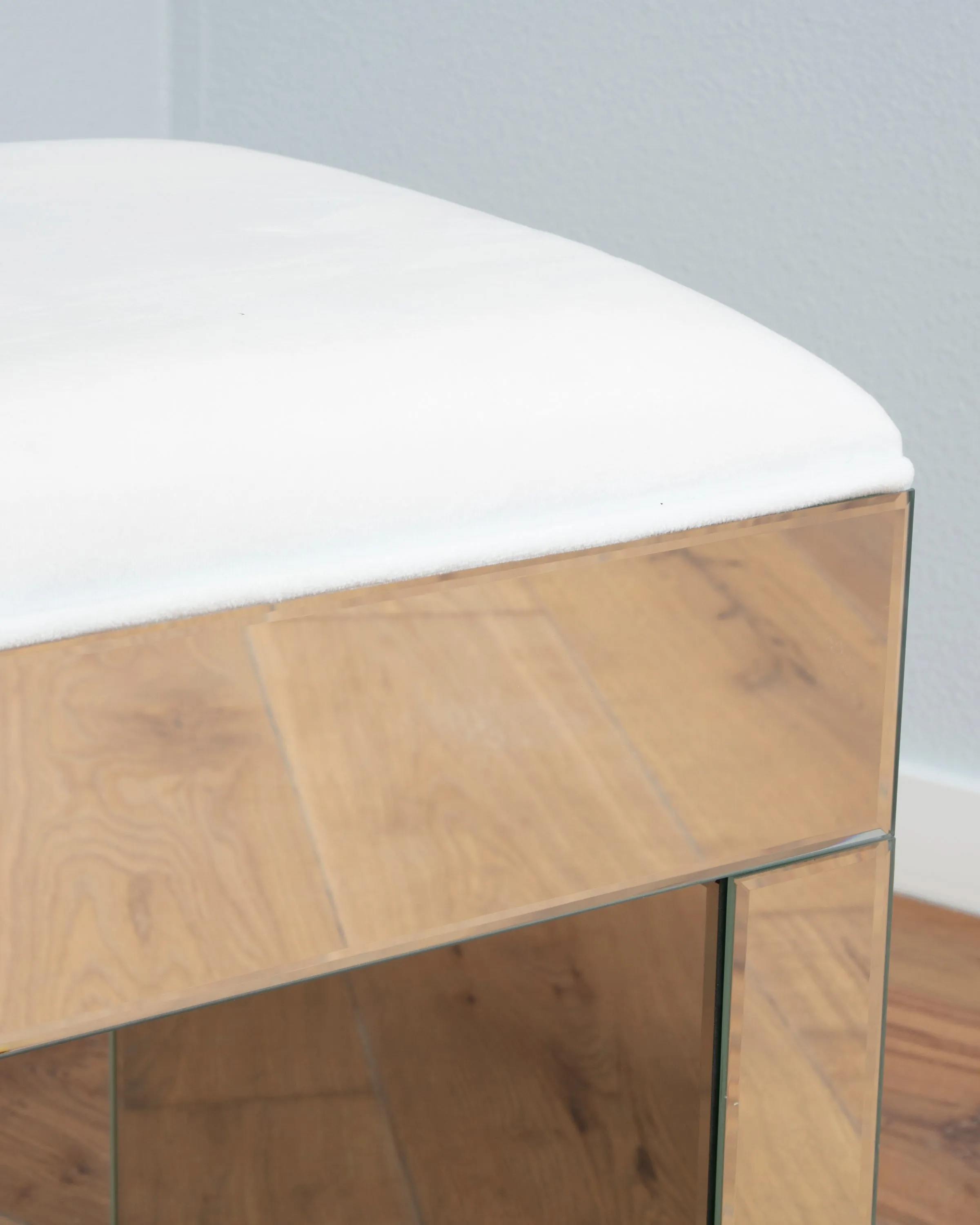 the mirrored vanity stool